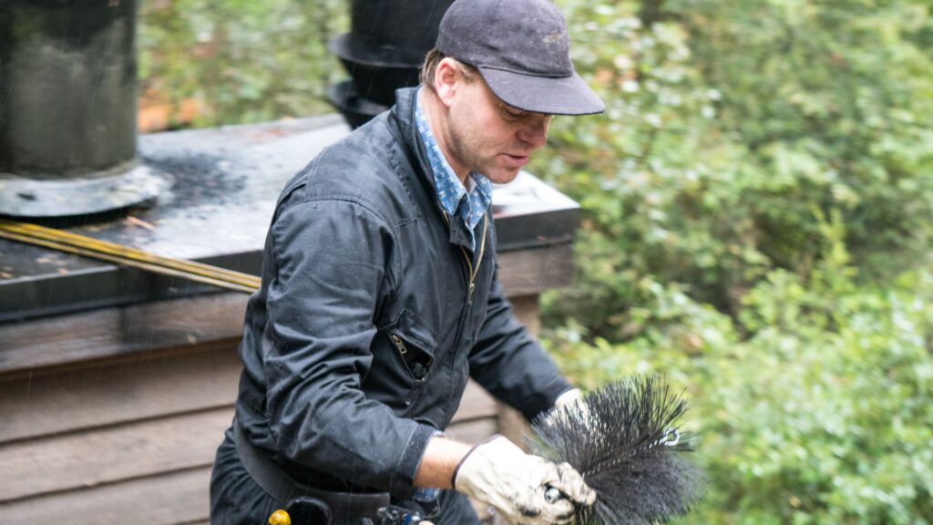 Chimney Sweep cleaning chimney
